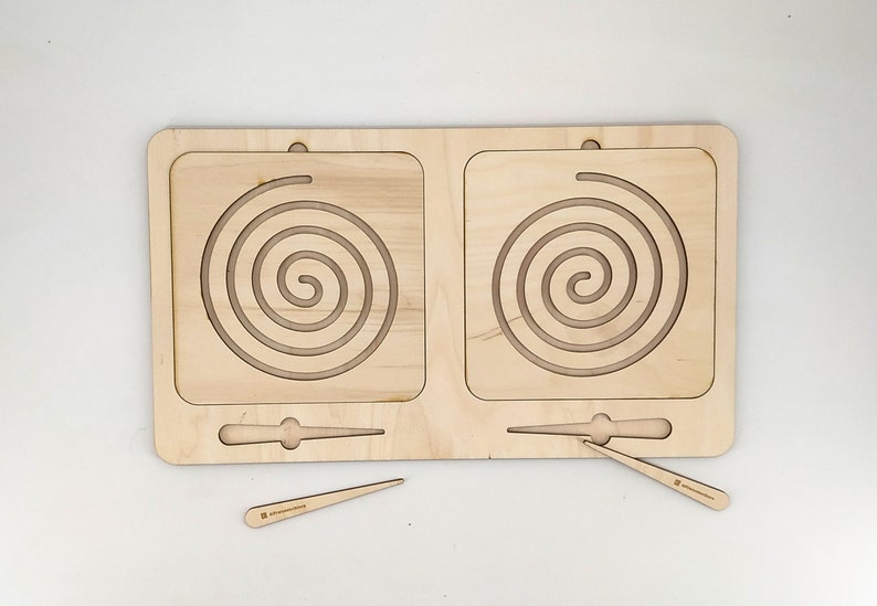 Reversible  tracing  board,  Montessori  educational  resource