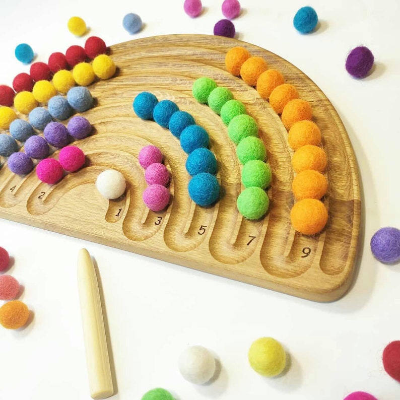 Rainbow tracing board  with felt balls